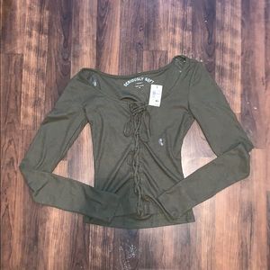 Tight green long sleeve shirt